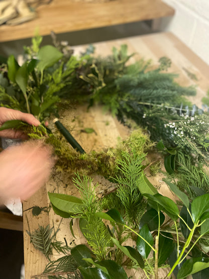 Christmas wreath workshop - adding foliage to the base